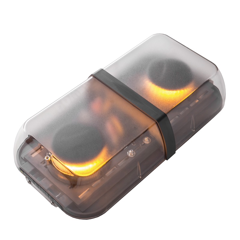Jiný pohled na rozsvícenou oranžovou/clear LED majákovou mini rampu Optima Eco90, délky 50cm, výšky 9cm, 12/24V, R65 od výrobce P.P.H. STROBOS