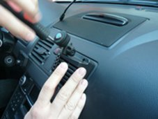 Monitor bracket for ventilation grille