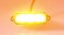 Pohled na rozsvícený oranžový LED predátor